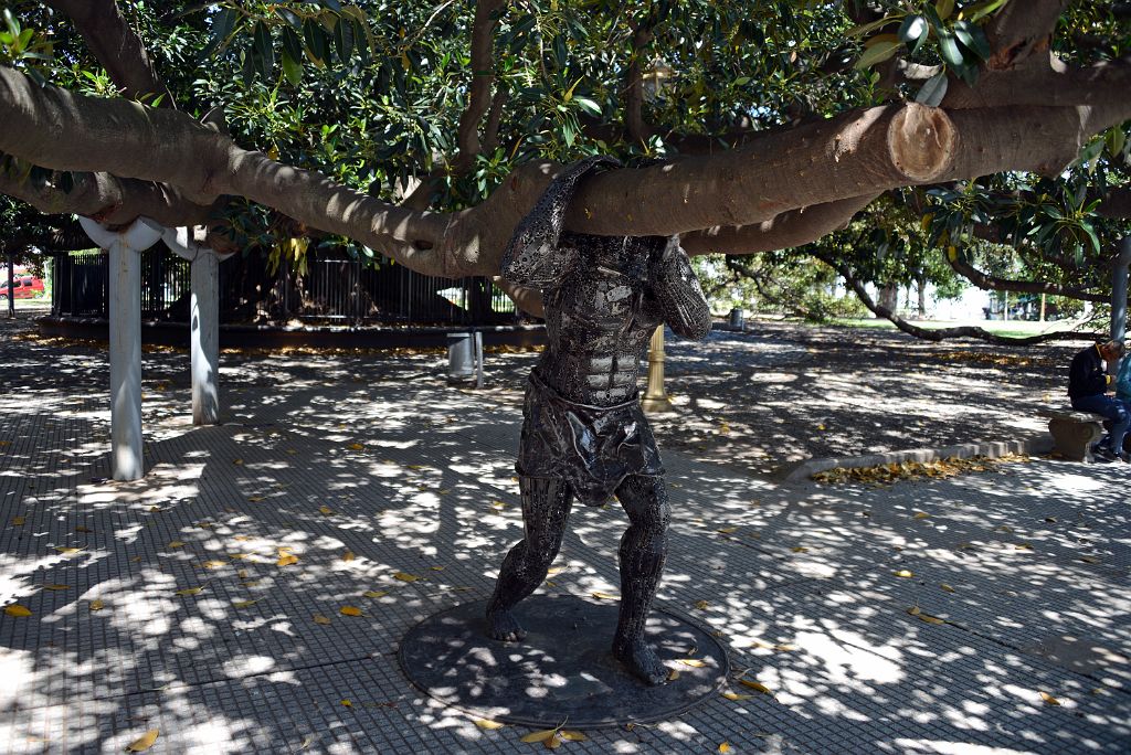 15 Sculpture Of Man Holding Up Large Tree Plaza Ramon J Carcano In Recoleta Buenos Aires